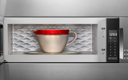 KitchenAid brand dishware inside a KitchenAid® low profile microwave