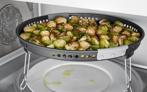 Brussels sprouts in an air fryer basket